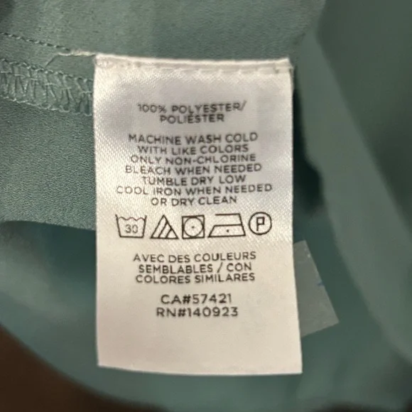 Women’s top by Loft. Medium with short sleeves and button down back, so cute. - Picture 3 of 4